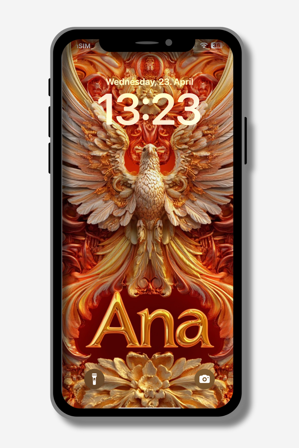 A smartphone displays a vibrant digital artwork on its lock screen. The artwork features a majestic, intricately detailed phoenix with outstretched wings in shades of gold, orange, and cream, rising from fiery patterns. Below the phoenix, the name "Ana" is written in a bold, golden font. The time on the screen reads "13:23" and the date is "Wednesday, 23. April". Icons for a flashlight and camera are visible at the bottom.