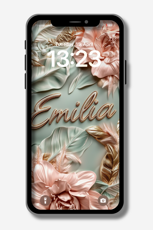 A smartphone displays a soft, floral digital artwork on its lock screen. The design features stylized flowers and leaves in muted pastel shades of pink, green, and gold. The name "Emilia" is written in an elegant, golden script across the center. The time on the screen reads "13:23" and the date is "Tuesday, 15. April". Icons for a flashlight and camera are visible at the bottom.